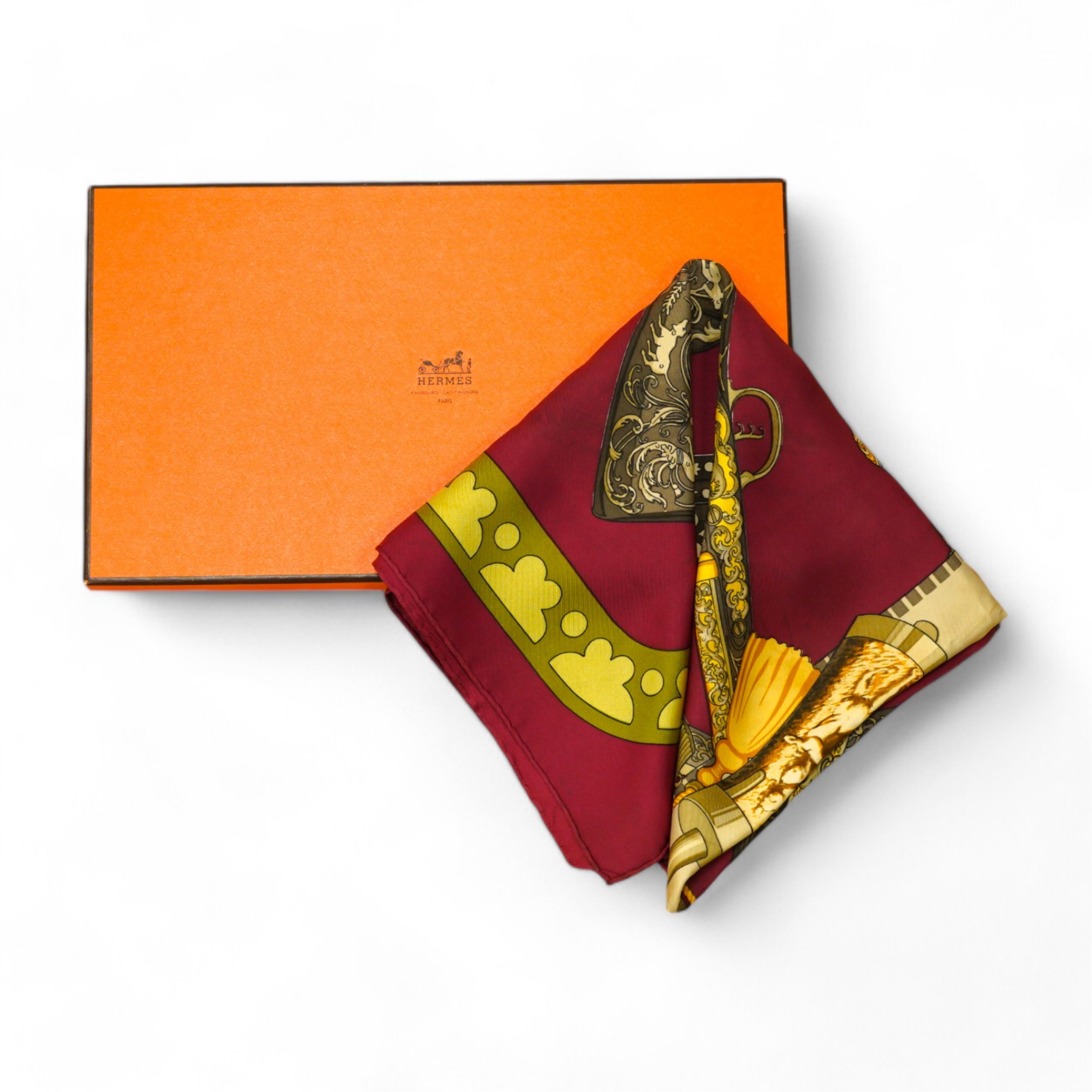 A Hermes silk scarf 'Diane', boxed. Condition - fair